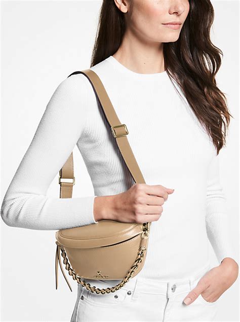 michael michael kors slater extra-small pebbled leather sling pack|belt bag Michael Kors outlet.